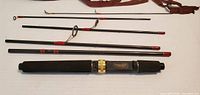 All five rod sections and handle laid out