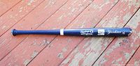 Full view of blue Rawlings Adirondack bat with Yankees and Coke logos