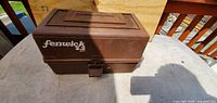 Closed brown Fenwick 2.2 tackle box exterior