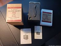 Camera, original box with lid, white inner sleeve, manuals overview