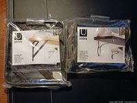 Both sealed Umbra Strut and Trillis bracket packages