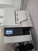Top and front view of Brother MFC-L3770CDW printer