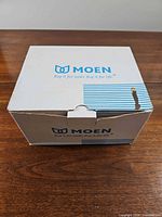 Sealed Moen branded box