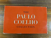 Top of orange slipcase showing title The Paulo Coelho Collection