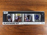 Front of boxed Star Wars glassware set showing four designs
