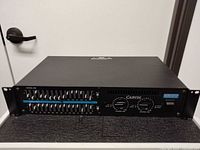 Front view of Carvin DCM1015 amplifier in rack-mount form