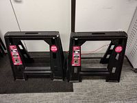 Front view of both Husky sawhorses standing side by side