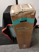 Full view of boxed mattress showing front graphics and top flap condition