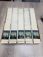 Open box showing five columns filled with identical Beatles cards number P1