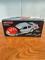 Sealed display box of Action 1:24 Martin Truex Jr. #8 car