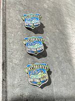 Front view of three identical 2019 Biketoberfest Daytona Beach pins