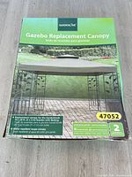 Front of boxed Gardenline gazebo replacement canopy model 47052