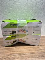 Two strapped boxes showing Premium toner cartridge packaging