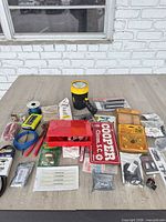 Overall lot on tabletop showing all items