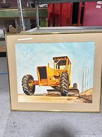 Full view of framed road grader artwork showing image, mat and frame