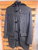 Front view of charcoal grey wool duffle coat