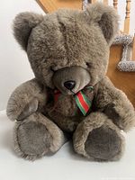 Front view of brown plush teddy bear seated showing overall size and texture