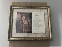 Overall view of framed angel print and poem