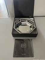 dish in open box with leaflet shown