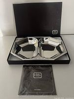 Dish in open box with booklet visible