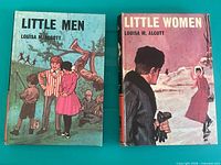 Both hardcover books front covers visible