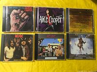 All six CD fronts laid out in two rows