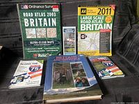 All six publications front covers visible