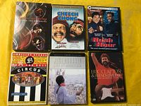 All six DVD cases front covers visible