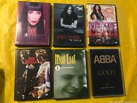 All six DVD cases front covers visible