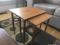 pair of nesting tables showing relative sizes and finish
