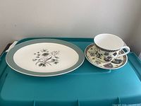Overall shot of platter, teacup and saucer
