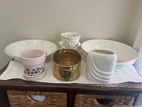 Group shot of all six decorative items on cabinet