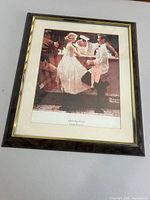 Full view of framed print with mat and frame visible
