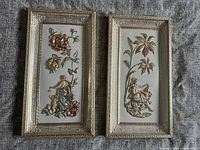 Both plaques side by side showing overall design and frames