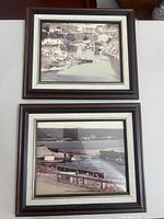 Front view of both framed prints showing imagery and frames
