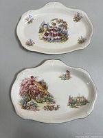 Both trays front view showing full designs and shape
