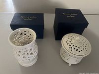 Both warmers with their boxes visible