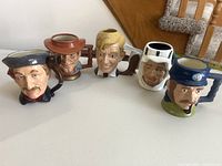 group shot showing all five character jugs