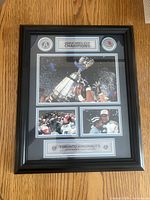 Full view of framed Toronto Argonauts 2004 Grey Cup memorabilia