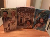 Front view of all three VHS titles standing upright