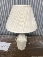 Full view of table lamp showing shade and base