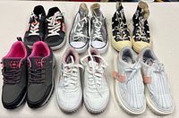 All six pairs displayed on table in two rows