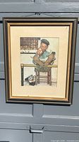 Framed Norman Rockwell "The Lion's Share" lithograph print under glass with mat and frame