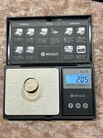 Ring on digital scale showing 2.05 grams