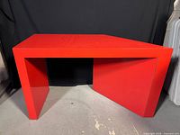 front view of red lacquer console table