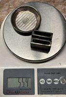 All pieces on scale showing 55.4 g combined weight