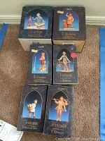 Six Fontanini villager figurine boxes showing names and images of each character Jacob, Isaak, Reuben, Joel, Orion, Andrew.
