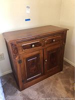 Full view of vintage wooden nightstand showing front, hardwood construction, wood grain detail, single drawer and double-door cabinet.