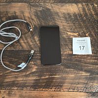 Front view of iPhone XS with braided USB-A to Lightning cable