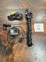 Entire lot showing camera, cables, mount buckle, gooseneck clamp